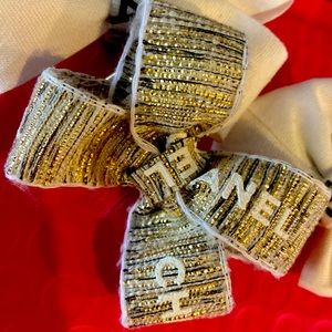 Authentic Chanel ribbon made into hair bow with clip.